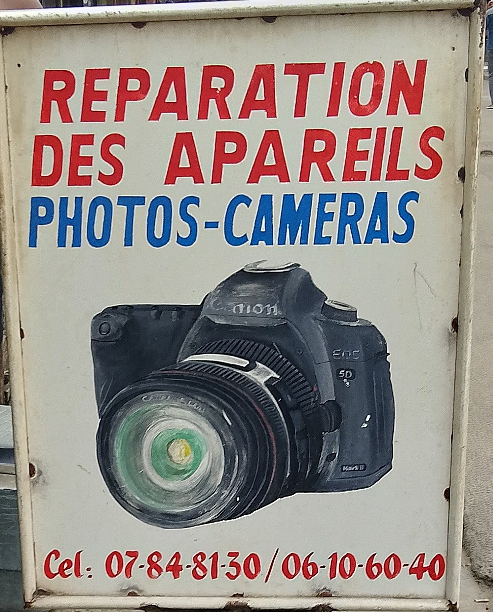 Réparateur DE CAMÉRA